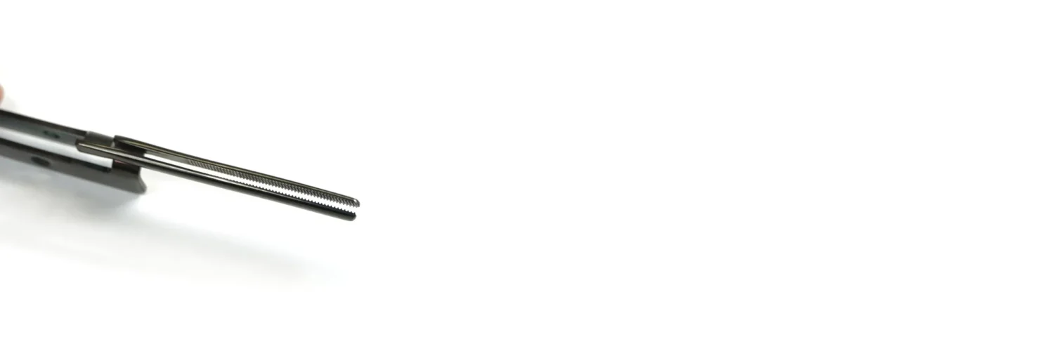 Promark® forceps with serrated Power Jaws™ for precise and secure holding of articulating paper when checking dental occlusion, recommended by KOL Patrick Allen LD