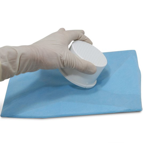 Perforated inner basket of Banicide® Tray allowing quick drainage of sterilizing solution from burs