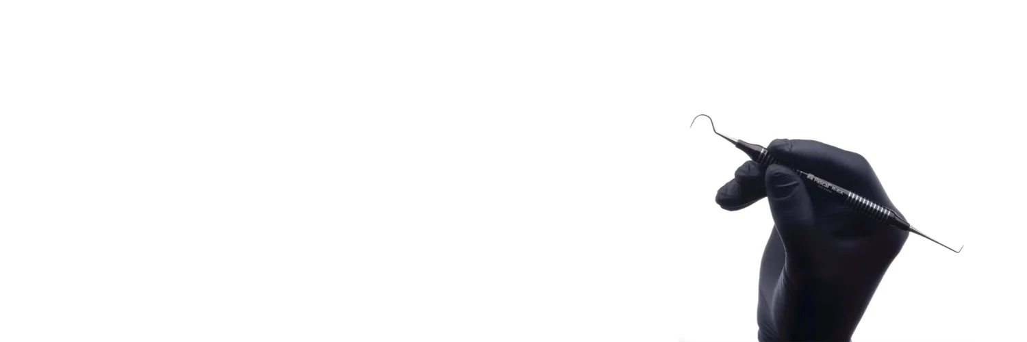 R-Ex dental instrument for measuring and removing retraction cords, featuring stainless steel tips, black PVD-Tech Titanium Nitride coating, and lightweight ergonomic handle