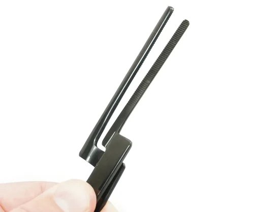 Close-up of Promark® serrated Power Jaws™ securely gripping articulating paper